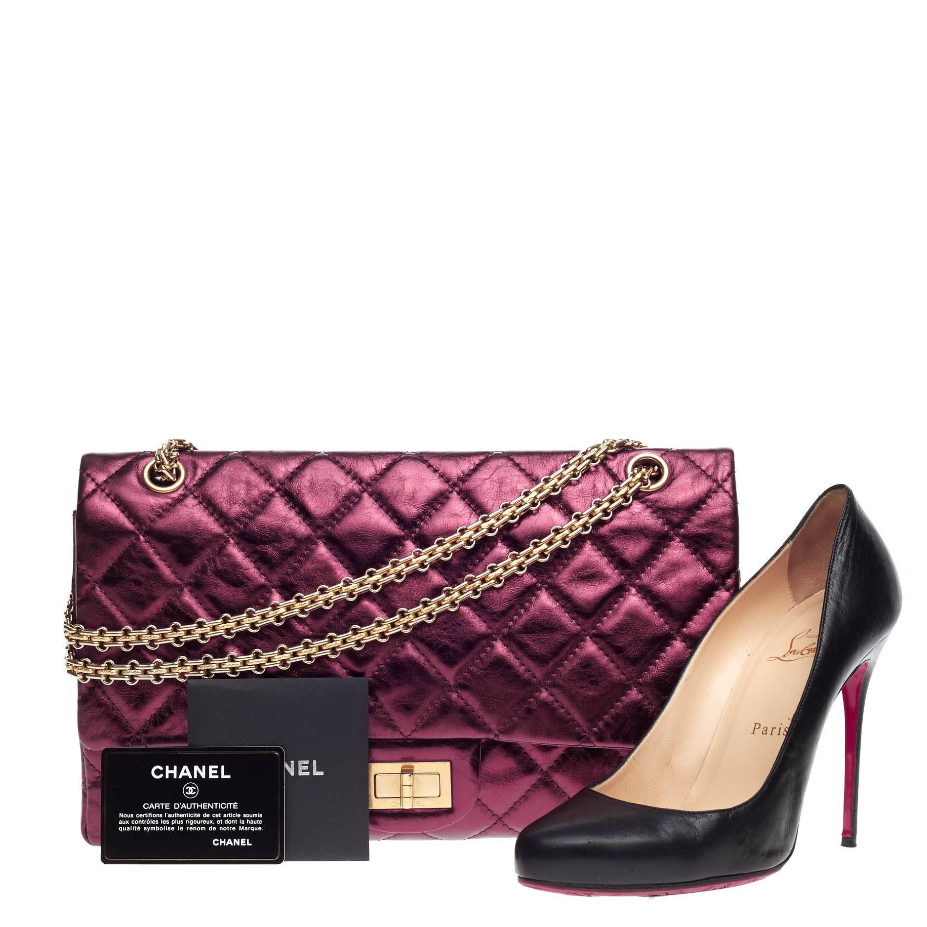 This authentic Chanel Reissue 2.55 Quilted Aged Calfskin 227 is an elegant and timeless piece to add to any collection. Crafted from supple metallic dark red calfskin leather, this stand-out flap features signature diamond quilting, iconic Chanel