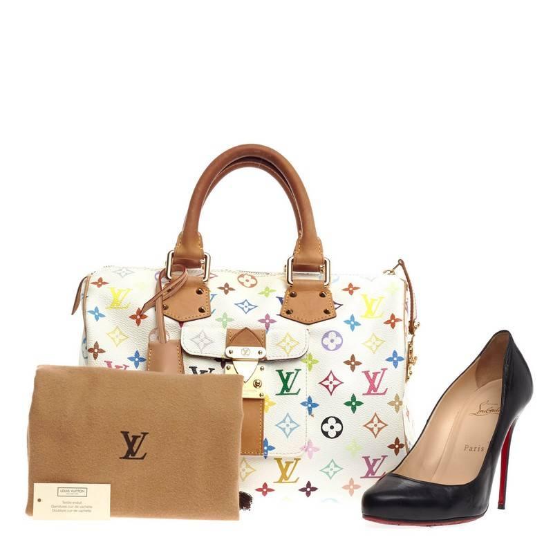 This authentic Louis Vuitton Speedy Monogram Multicolor 30 is vibrant and elegant, made for a sophisticated traveling fashionista. Crafted from Louis Vuitton’s signature white monogram multicolor print coated canvas, this iconic bag features
