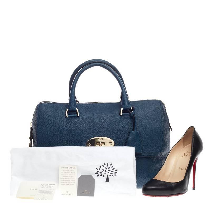 This authentic Mulberry Del Rey Bag Leather Medium presented in the brand's Fall/Winter 2012-2013 Collection was inspired and named after stylish American singer Lana Del Rey. Crafted in slate blue leather, this chic satchel features a dual-rolled