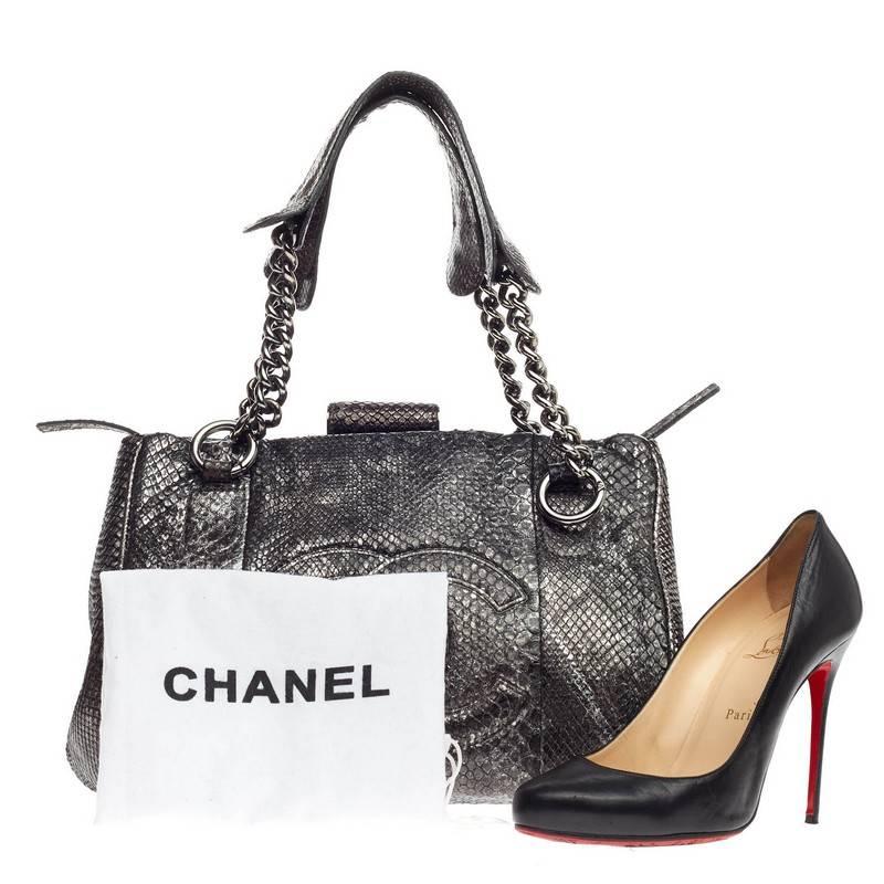 This authentic Chanel Perfect Day Tote Python Medium combines casual luxe style with understated functionality perfect for daily and work excursions. Crafted from silver genuine python skin, this chic tote features a stitched CC interlocking logo,