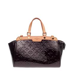 Yes, this bag is the rare discontinued Louis Vuitton Brea MM in