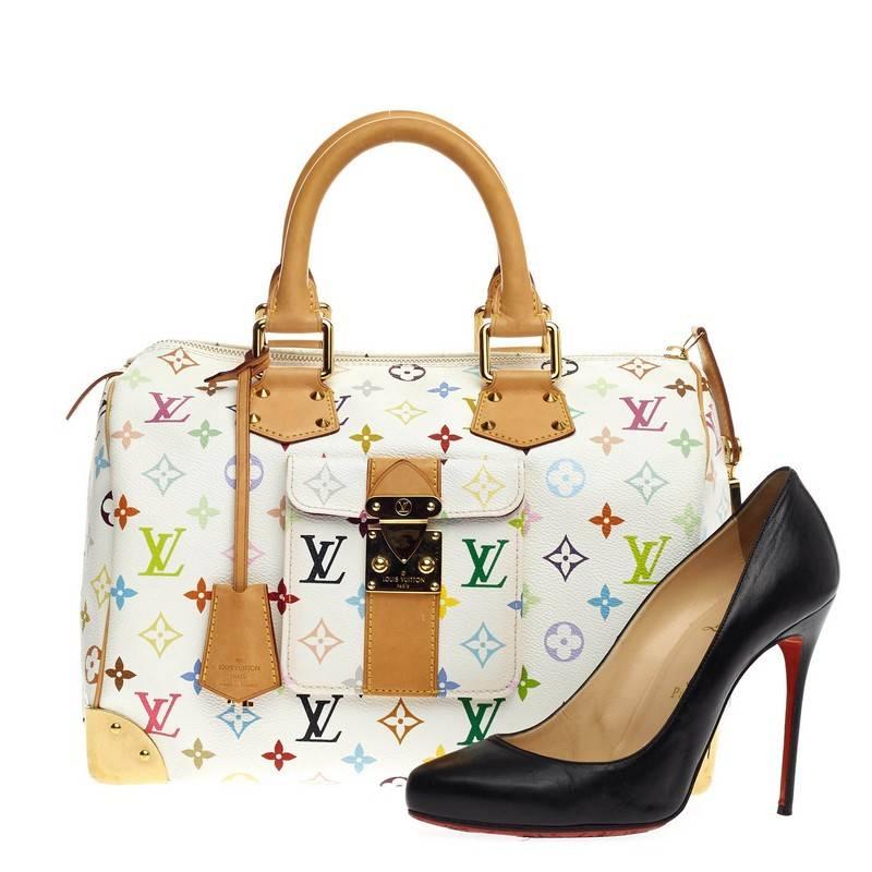 This authentic Louis Vuitton Speedy Monogram Multicolor 30 is vibrant and elegant, made for a sophisticated traveling fashionista. Crafted from Louis Vuitton’s signature white monogram multicolor print coated canvas, this iconic bag features