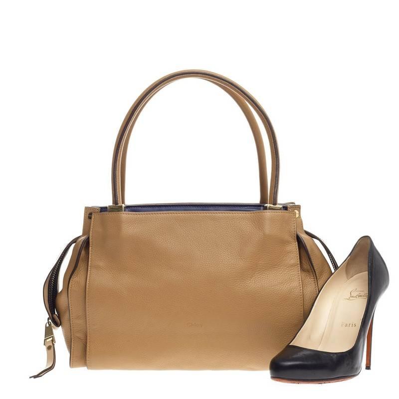 This authentic Chloe Dree Tote Pebbled Leather Medium from the brand's Pre-Fall 2014 Collection is an understated, stylish tote that will fit your daily essentials. Crafted from supple tan leather, this bag features dual-rolled leather handles,