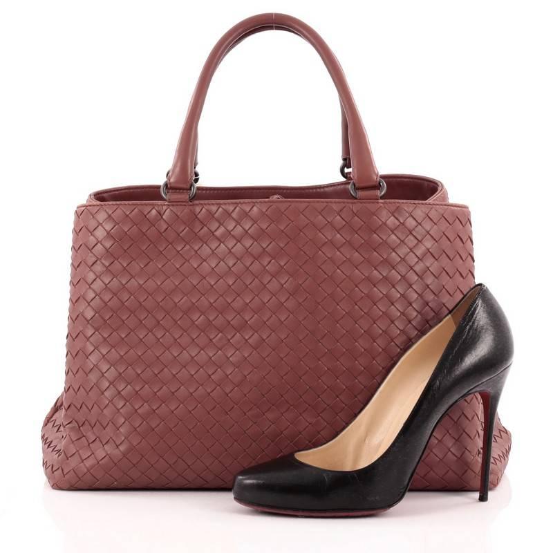 This authentic Bottega Veneta Milano Tote Intrecciato Nappa Large is a timeless, versatile piece you can surely take from day to night. Beautifully crafted in brique brown nappa leather in Bottega Veneta's signature intrecciato woven method, this