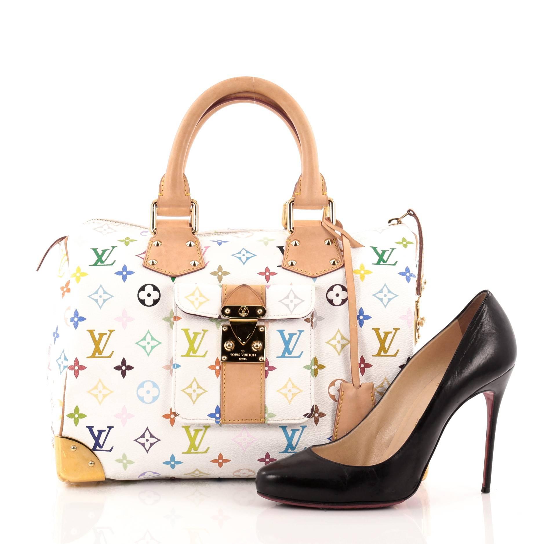 This authentic Louis Vuitton Speedy Monogram Multicolor 30 is vibrant and elegant, made for a sophisticated traveling fashionista. Crafted from Louis Vuitton’s signature white monogram multicolor print coated canvas, this iconic bag features