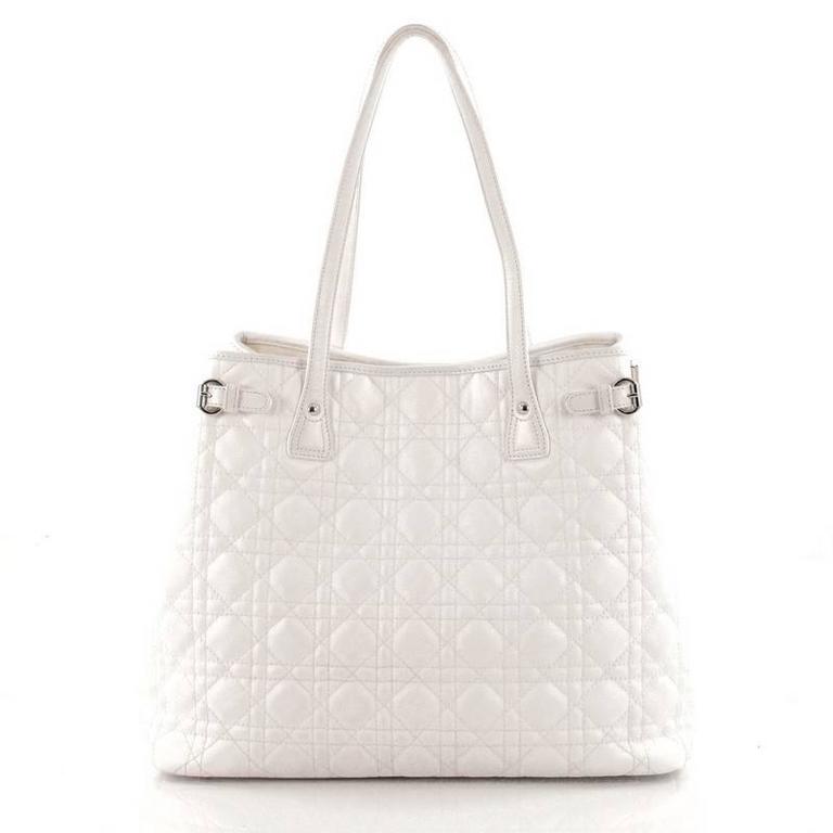 CHRISTIAN DIOR, a frosted white canvas Dior Panarea shopping bag