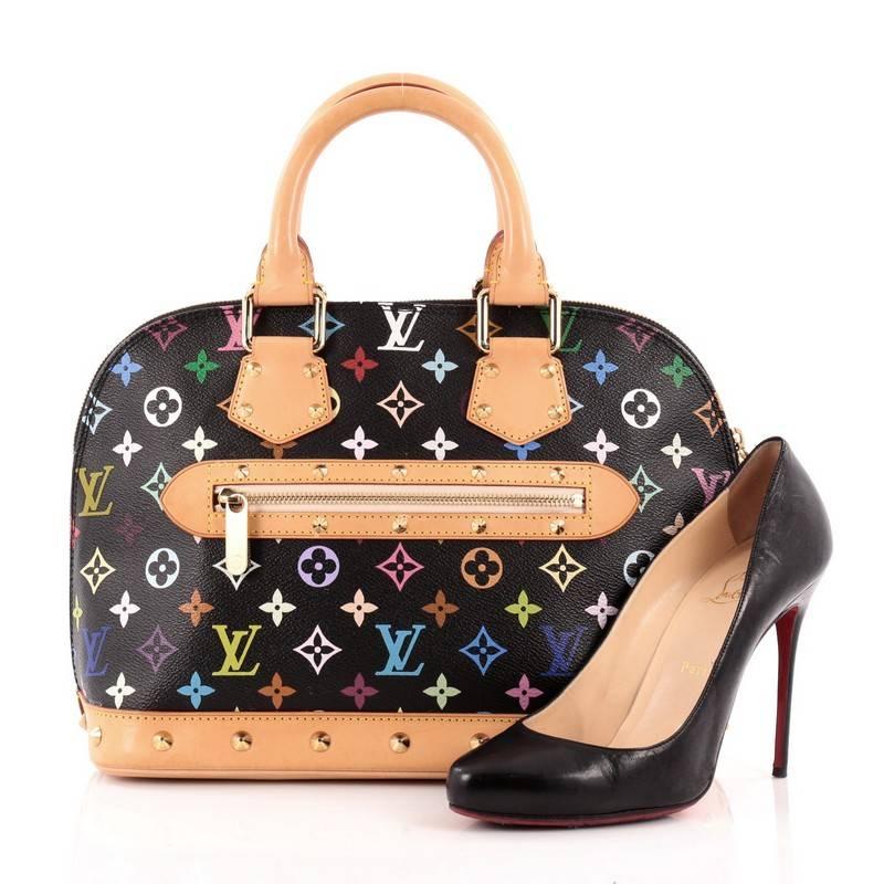 This authentic Louis Vuitton Alma Monogram Multicolor PM is a versatile structured bag that complements both dressy and casual look perfect for the modern woman. Designed with black monogram multicolor and vachetta leather base, this structured