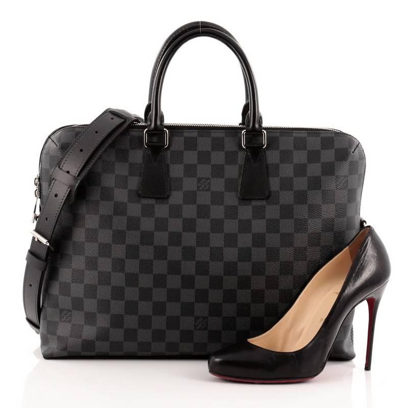 This authentic Louis Vuitton Porte-Documents Jour Damier Graphite is perfect for daily or business excursions. Crafted from the brand's iconic damier graphite canvas, this stylish and functional bag features dual-rolled leather handles, two-way zip