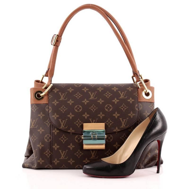 This authentic Louis Vuitton Olympe Monogram Canvas showcases the brand's heritage-inspired style with an added sophistication. Crafted from Louis Vuitton’s signature brown monogram coated canvas and havane brown leather trims, this sturdy tote