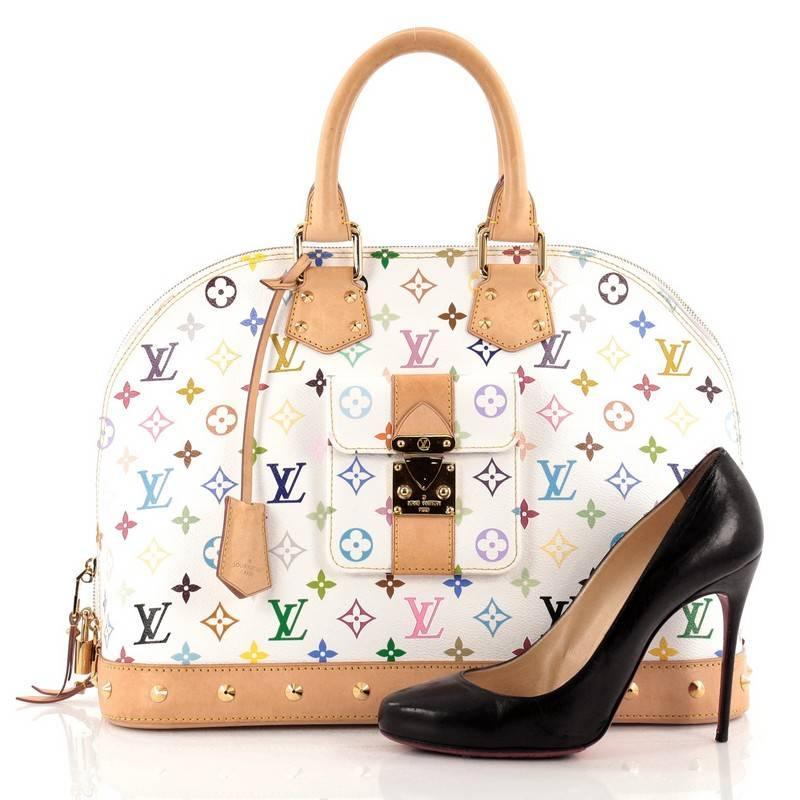 This authentic Louis Vuitton Alma Handbag Monogram Multicolor GM is a versatile structured bag that complements both dressy and casual look perfect for the modern woman. Designed with white monogram multicolor coated canvas with vachetta leather