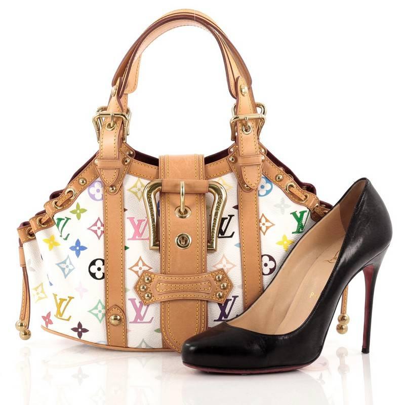 This authentic Louis Vuitton Theda Handbag Monogram Multicolor GM is a vibrant and colorful bag perfect for everyday use. Crafted from Takashi Murakami's popular white multicolor monogram print coated canvas, this feminine bag features dual belted