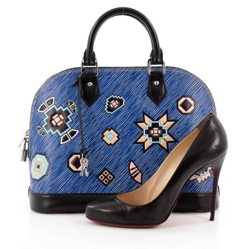 This authentic Louis Vuitton Alma Handbag Limited Edition Azteque Epi Leather PM released in the brand's Fall/Winter 2015 Collection updates its classic design with a stand-out, modern design. Constructed with Louis Vuitton's signature textured epi