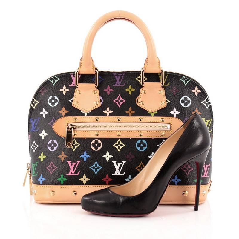 This authentic Louis Vuitton Alma Handbag Monogram Multicolor PM is a versatile structured bag that complements both dressy and casual look perfect for the modern woman. Designed in Takashi Murakami's famous black monogram multicolor print coated