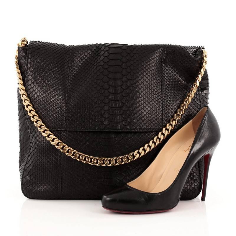 This authentic Celine Gourmette Shoulder Bag Python Large mixes simple style with luxurious craftsmanship. Crafted from black genuine python skin, this slouchy, no-fuss hobo features a large frontal flap and single gold chain strap and gold-tone