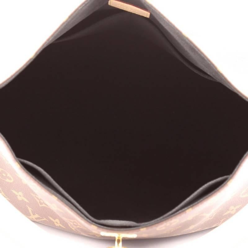 Louis Vuitton Gaia Handbag Monogram Canvas In Good Condition In NY, NY