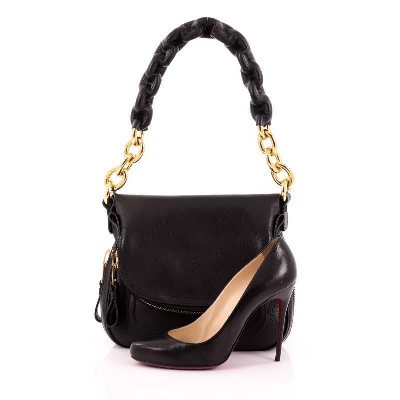 This authentic Tom Ford Chain Jennifer Shoulder Bag Leather Medium redefines modern luxury with timeless elegance. Crafted in classic black leather, this signature saddle shoulder bag features maxi chain-link shoulder strap covered with leather,