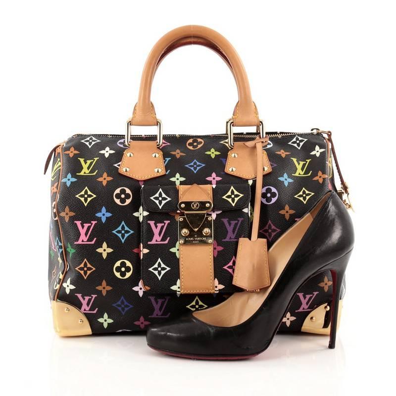 This authentic Louis Vuitton Speedy Handbag Monogram Multicolor 30 is vibrant and elegant, made for a sophisticated traveling fashionista. Crafted from Louis Vuitton’s signature black monogram multicolor coated canvas, this iconic bag features
