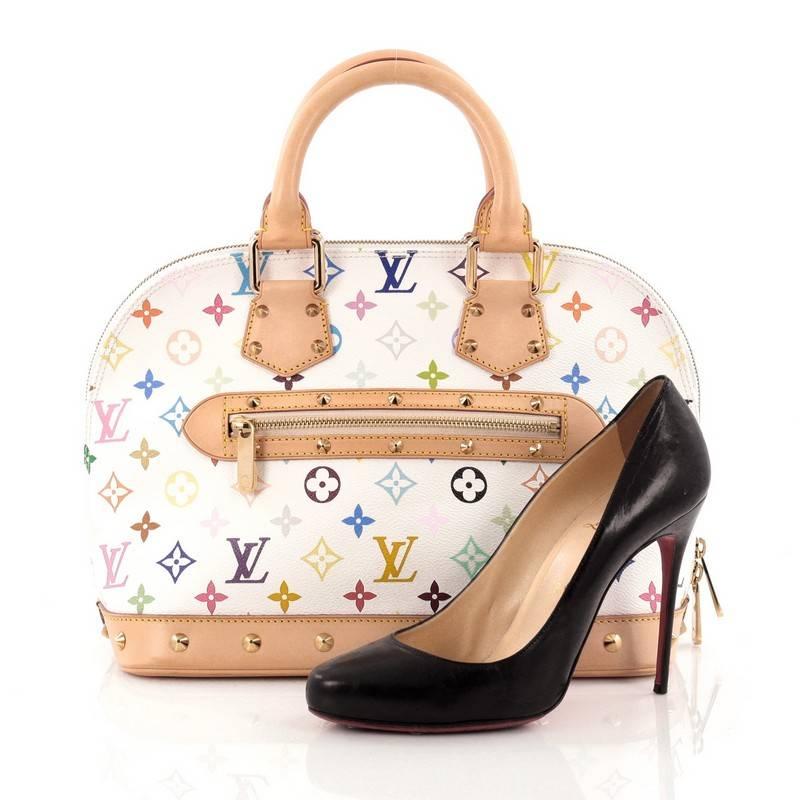 This authentic Louis Vuitton Alma Handbag Monogram Multicolor PM is a versatile structured bag that complements both dressy and casual look perfect for the modern woman. Designed in Takashi Murakami's famous white monogram multicolor print coated