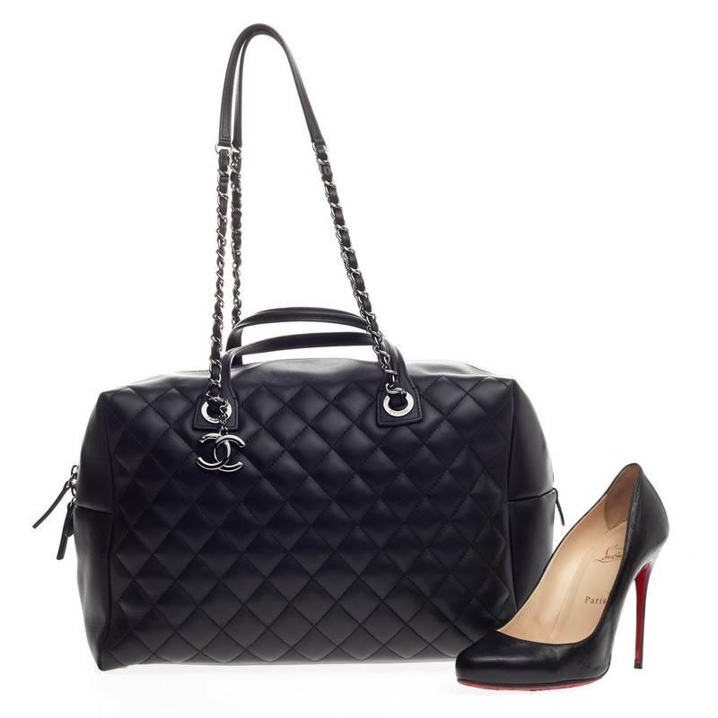 This authentic Chanel Feather Weight Bowling Bag Quilted Calfskin Large presented in the brand's Spring/Summer 2016 Act 1 Collection balance the brand's penchant for timeless design with luxurious, modern edge. Crafted from black calfskin leather,