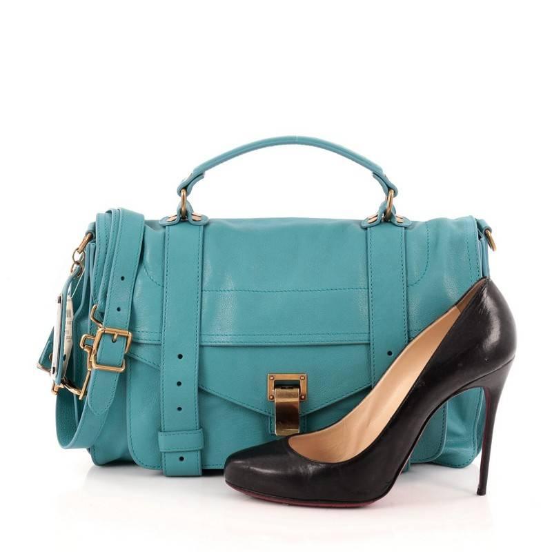 This authentic Proenza Schouler PS1 Satchel Leather Medium is the ideal way to travel with style and functionality. Constructed from turquoise leather, this popular satchel features an envelope-style front flap with two straps that slide through