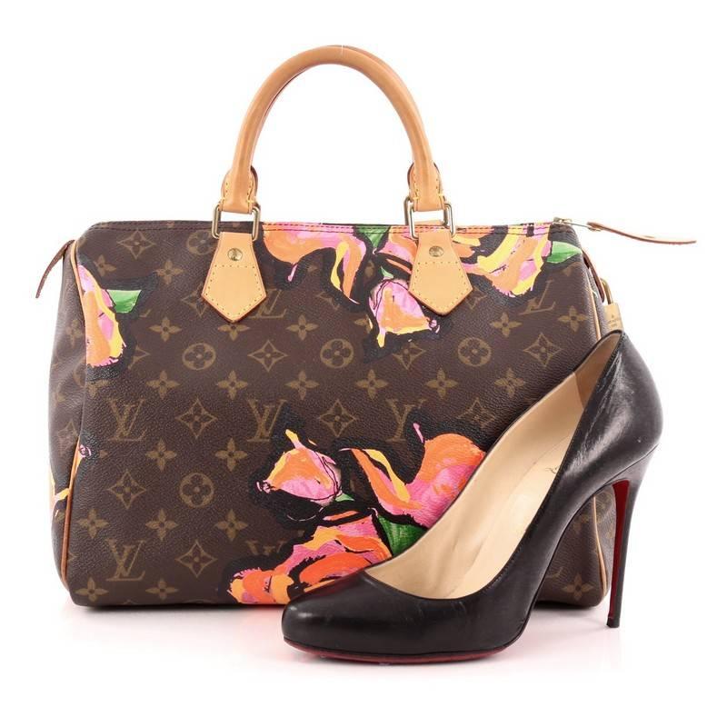 This authentic Louis Vuitton Speedy Handbag Limited Edition Monogram Canvas Roses 30 for its 2009 Collection is created by Marc Jacobs as a tribute to the late artist, Stephen Sprouse. Crafted in the brand's signature rown monogram coated canvas