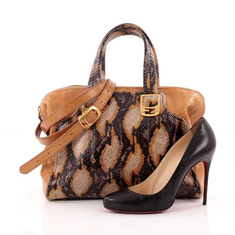 This authentic Fendi Chameleon Convertible Satchel Python Small showcases a simple, classic design with a modern twist. Constructed in multicolored genuine python skin, this stylish satchel features dual-flat python top handles accented with gold