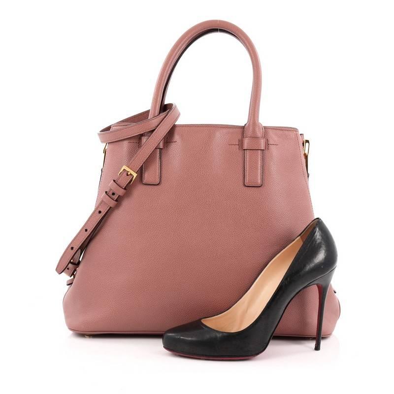 This authentic Tom Ford Jennifer Zip Tote Leather Medium redefines modern luxury with timeless elegance. Crafted in rose pink leather, this tote features dual-rolled handles, side zip gussets for expansion, protective base studs and gold-tone