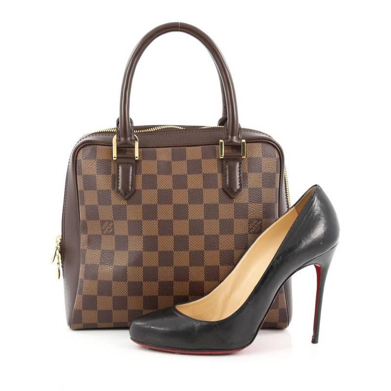 This authentic Louis Vuitton Brera Handbag Damier is a sophisticated and chic bag perfect for your eveyday looks. Crafted from damier ebene coated canvas, this versatile everyday bag features dual-rolled leather handles, dark brown leather trims and