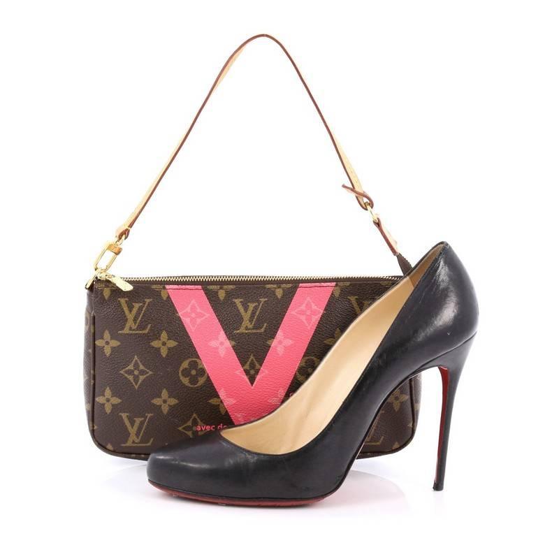 This authentic Louis Vuitton Pochette Accessoires Limited Edition Cities V Monogram Canvas mixes traditional design with modern styling. Crafted in iconic brown monogram coated canvas print with stylish “Volez, Voguez, Voyagez avec les Valises Louis