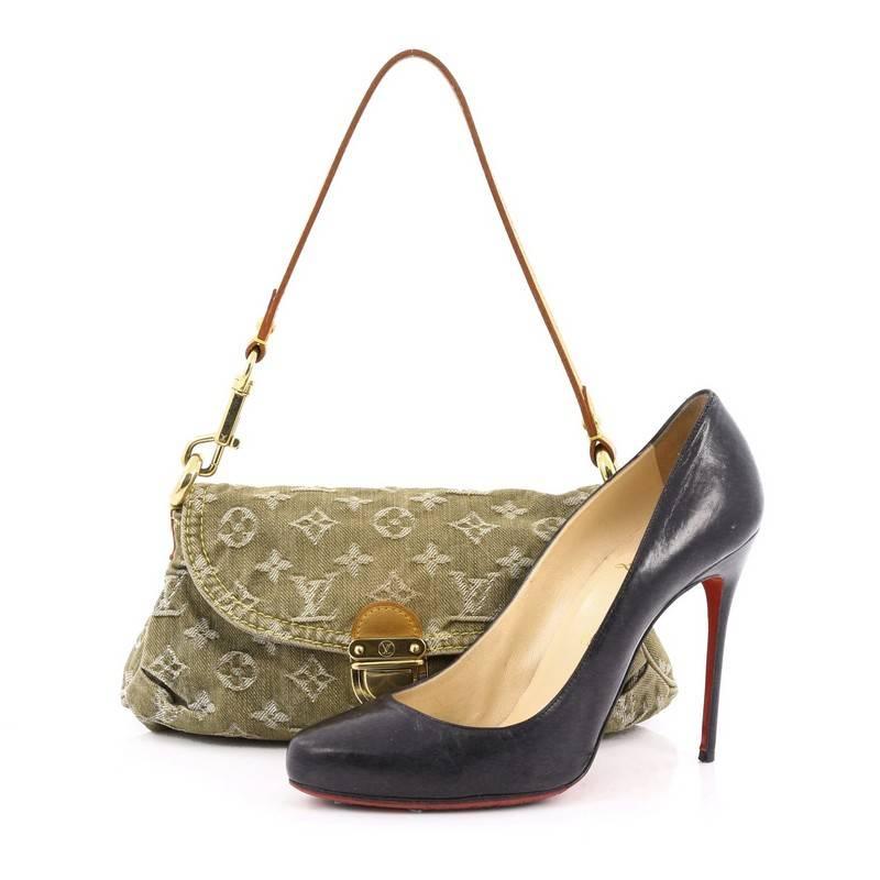 This authentic Louis Vuitton Pleaty Handbag Denim Mini is a fun and flirty bag from the brand's Monogram Denim collection. Crafted from green monogram denim, this mini shoulder bag features a removable vachetta leather handle allowing it to