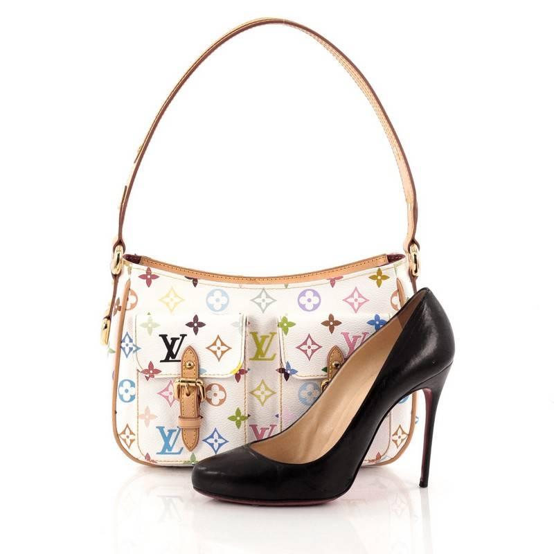 This authentic Louis Vuitton Lodge Handbag Monogram Multicolor PM combines style and functionality apt for the modern day woman. Constructed from Louis Vuitton's signature white monogram multicolor coated canvas, this classic shoulder bag features a