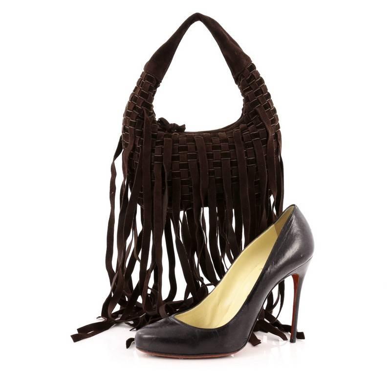 This authentic Bottega Veneta Fringe Hobo Intrecciato Suede and Velvet Mini is a timelessly elegant bag with a casual silhouette. Crafted from brown suede and velvet woven in Bottega Veneta's signature intrecciato method, this effortless, exquisite