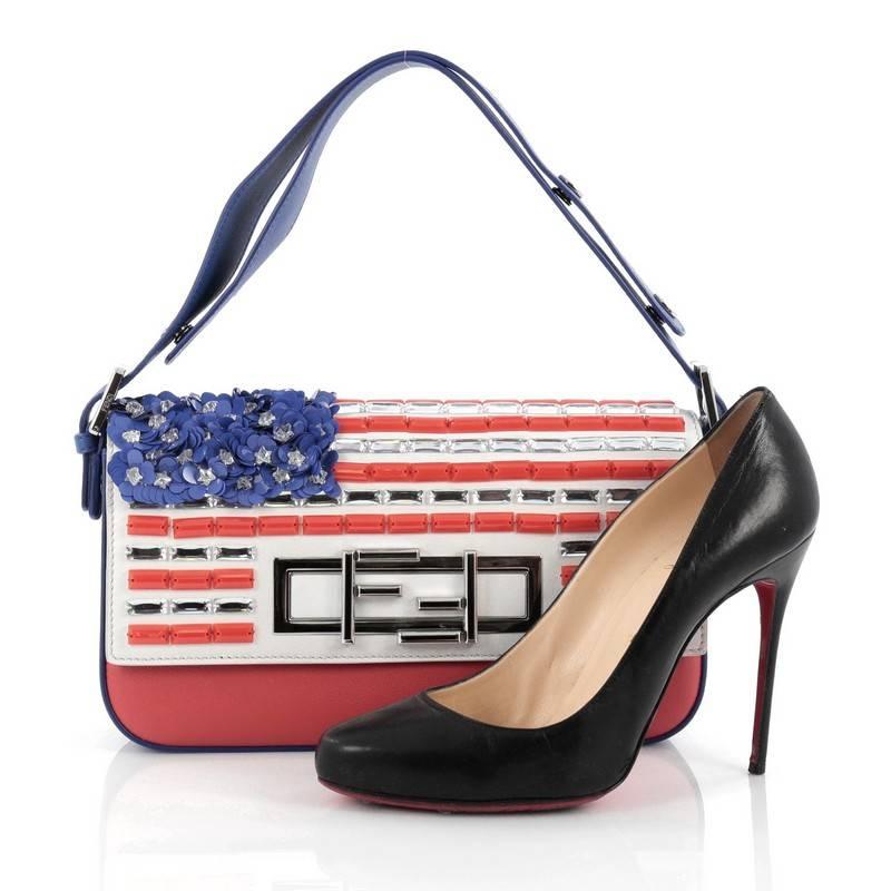 This authentic Fendi 3Baguette Shoulder Bag Crystal and Bead Embellished Leather is a fun, tasteful, and festive update to its classic Baguette bag. Crafted in red, white and blue leather with crystal and bead embellishment, this bag features an