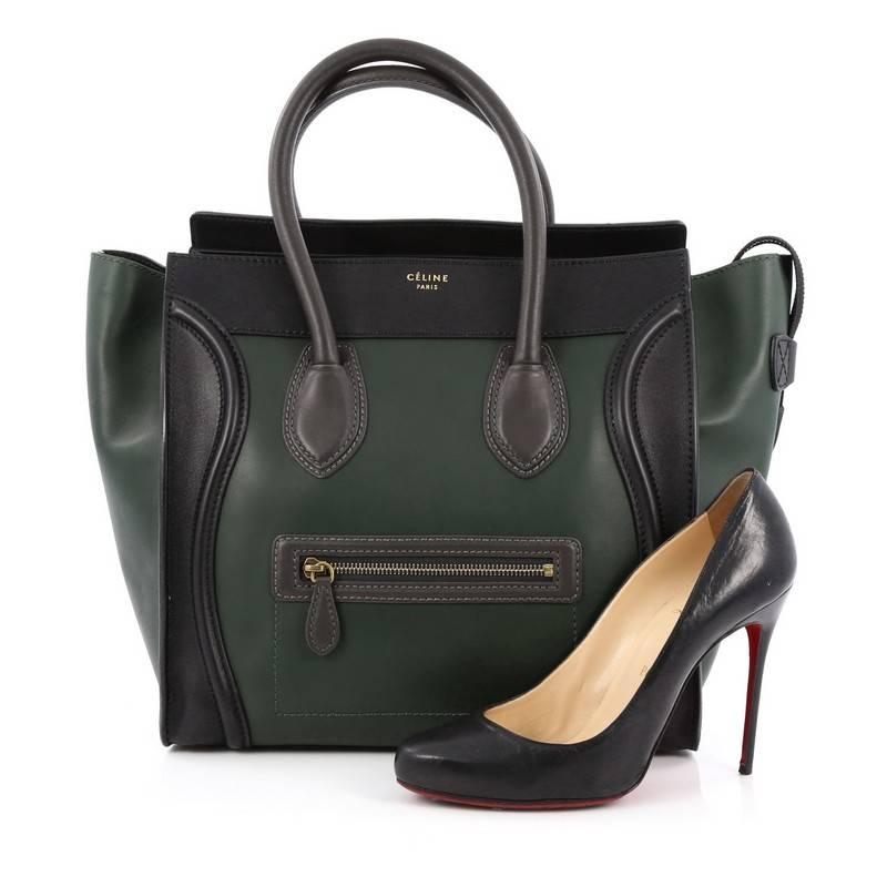 This authentic Celine Bicolor Luggage Handbag Leather Mini showcases an elegant day-to-day style essential for any fashionista. Constructed in beautiful bicolor green and black leather, this popular tote features a front zipper pocket, top zip