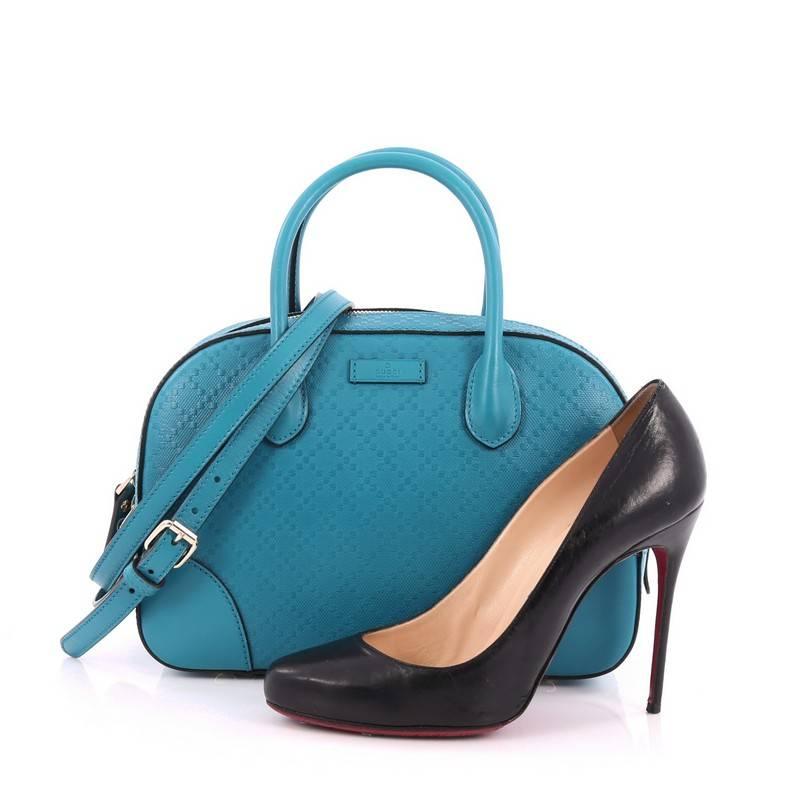 This authentic Gucci Bright Convertible Top Handle Bag Diamante Leather Small is sophisticated and modern in style perfect for everyday use. Crafted in Gucci’s diamante leather in teal, this bag features dual-rolled handles, protective base studs