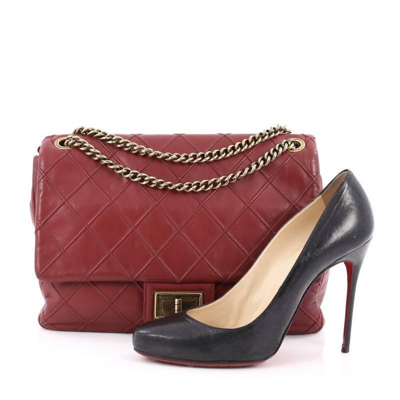 This authentic Chanel Cosmos Flap Bag Quilted Calfskin Jumbo presented in the brand's 2012-2013 Collection is elegant and stylish perfect for avid Chanel lovers. Crafted in red quilted calfskin leather, this stylish bag features aged gold chain link