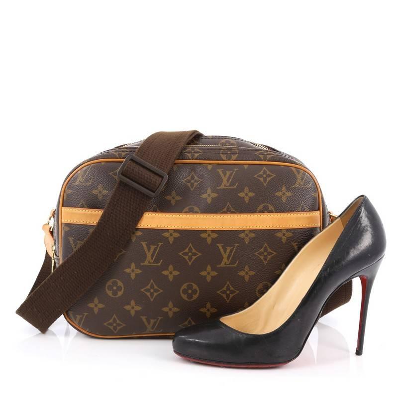This authentic Louis Vuitton Reporter Bag Monogram Canvas PM is the ideal messenger bag for any fashionable person. Inspired by photographer bags, this reporter features the brand's traditional monogram print, vachetta leather trimmings and