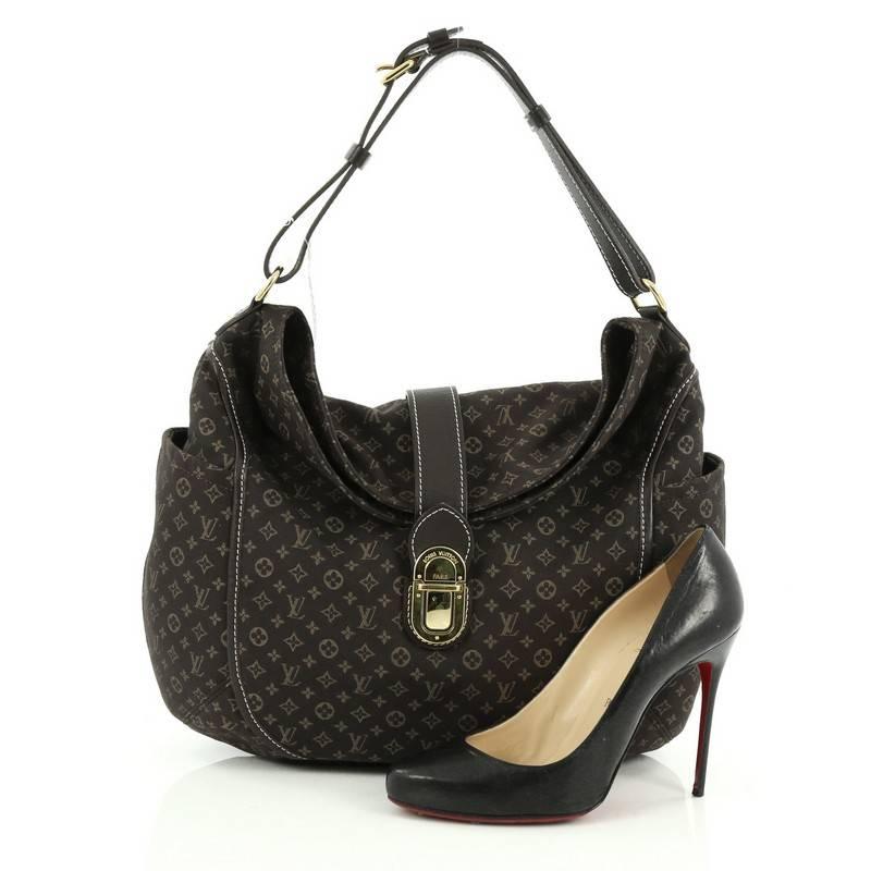 This authentic Louis Vuitton Romance Handbag Monogram Idylle is a statement piece you can surely take from day to night. Crafted with Louis Vuitton’s signature brown monogram fabric, this bag features side slip pockets, an adjustable shoulder strap,