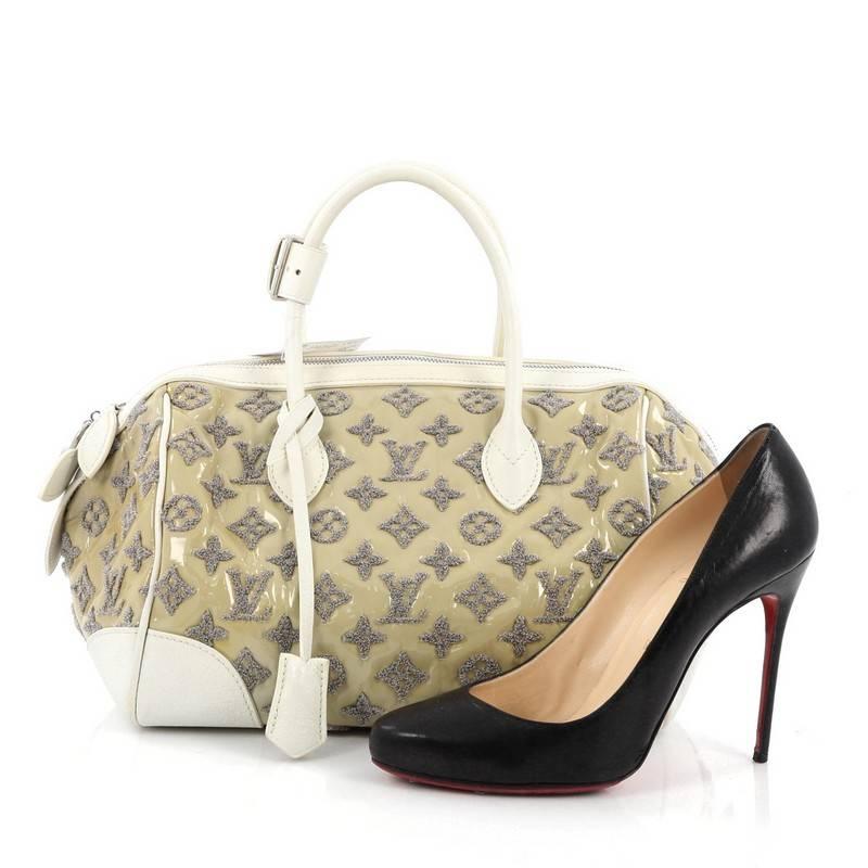 This authentic Louis Vuitton Round Speedy Bag Monogram Bouclettes is great for everyday wear and perfect for spring season. This Spring/Summer 2012 Limited Edition design features an embroidered monogram pattern on a light moss green patent leather