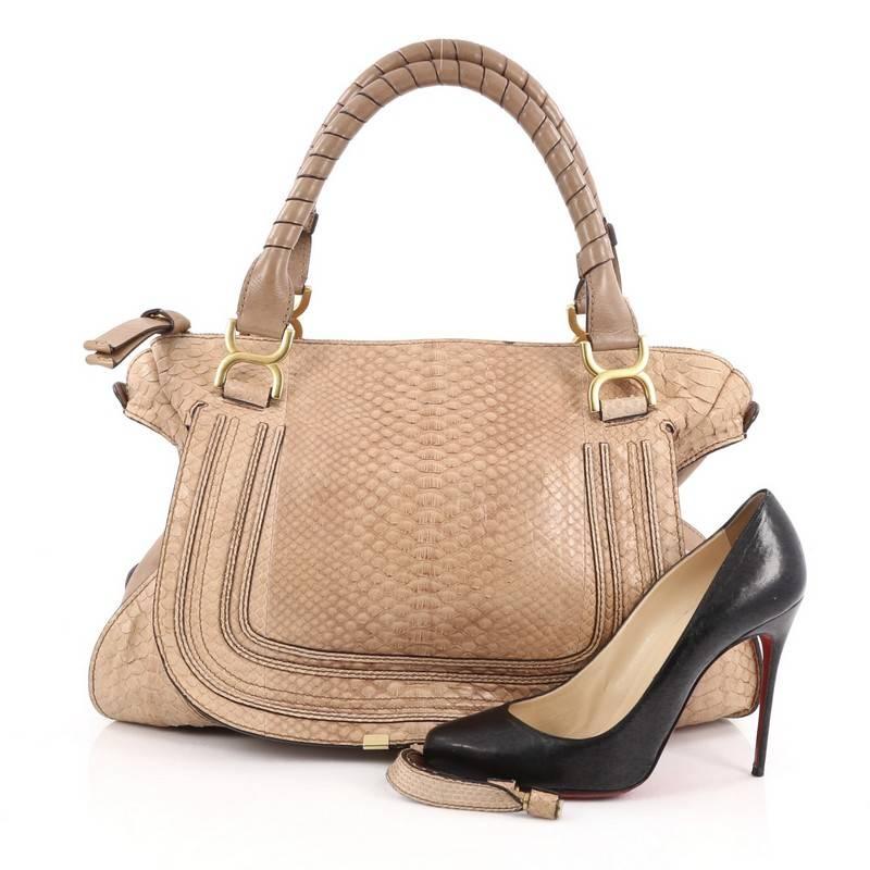 This authentic Chloe Marcie Shoulder Bag Python Large showcases the brand's popular horseshoe design in a classic hobo silhouette. Constructed from genuine brown python, this functional yet stylish hobo bag features a slouchy, easy-to-carry