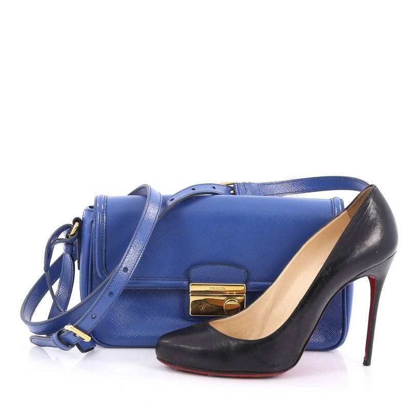 This authentic Prada Sound Shoulder Bag Vernice Saffiano Leather Small is the perfect bag for your everyday looks. Crafted in royal blue vernice saffiano leather, this petite bag features adjustable leather shoulder strap, frontal flap with engraved