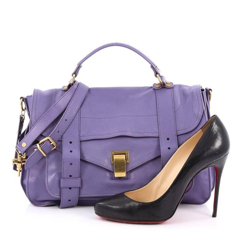 This authentic Proenza Schouler PS1 Satchel Leather Medium is the ideal way to travel with style and functionality. Constructed from purple leather, this popular satchel features an envelope-style front flap with two straps that slide through