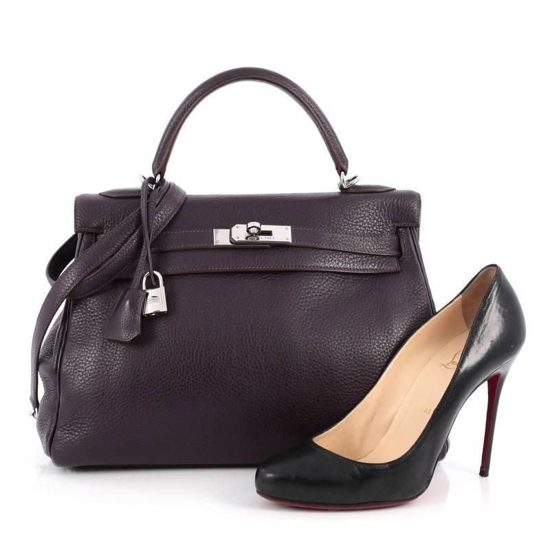 This authentic Hermes Kelly Handbag Raisin Clemence with Palladium Hardware 32 is as classic and timeless as they come. Designed from purple clemence leather, this classic style Kelly Retourne showcases Hermes' beautiful craftsmanship and devotion