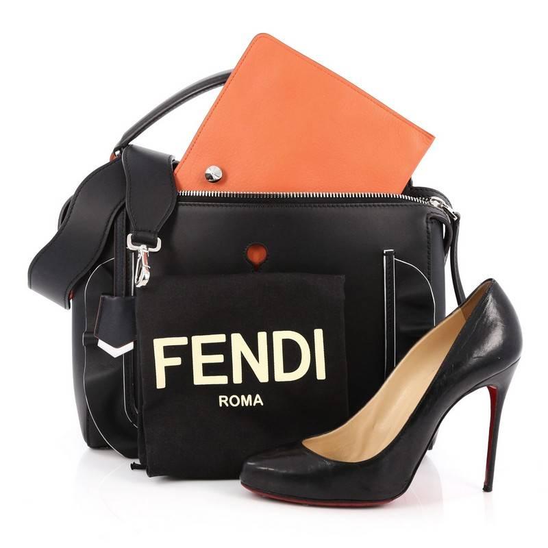 This authentic Fendi DotCom Convertible Satchel Ruffled Leather Medium is a chic and minimalist bag perfect for your everyday looks. Crafted from black leather with ruffle detailing, this understated satchel features a flat top handle, removable