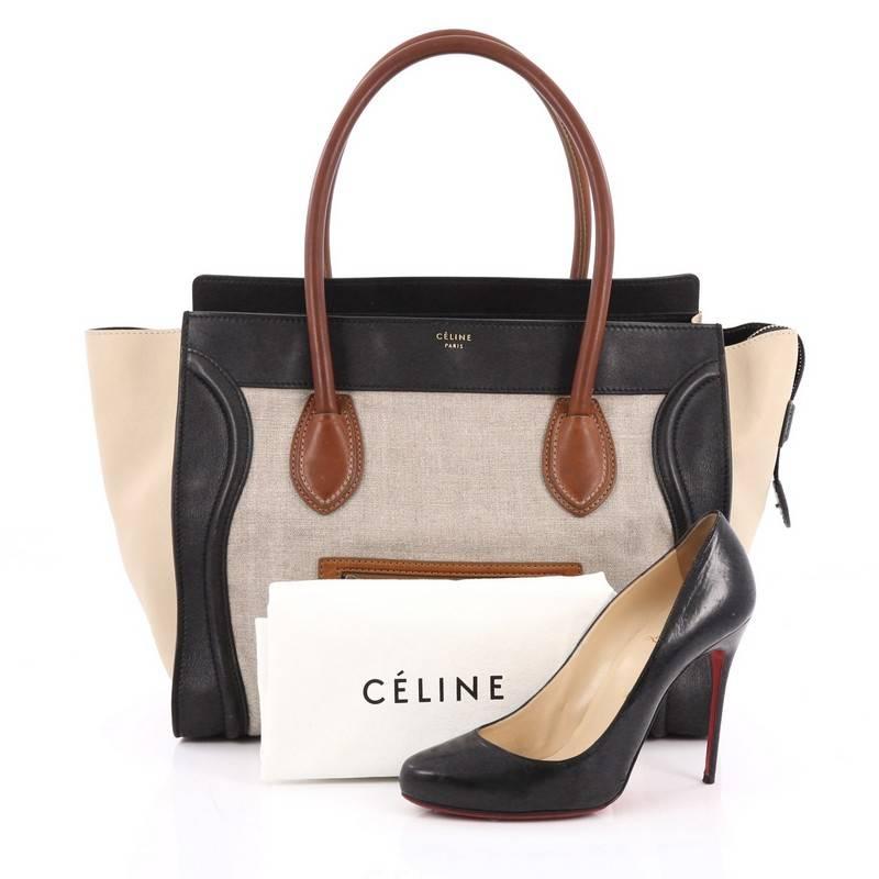 This authentic Celine Tricolor Shoulder Luggage Bag Canvas and Leather is one of the most sought-after bags beloved by fashionistas. Crafted from tricolor beige canvas, black and brown leather with beige leather side wings, this minimalist tote
