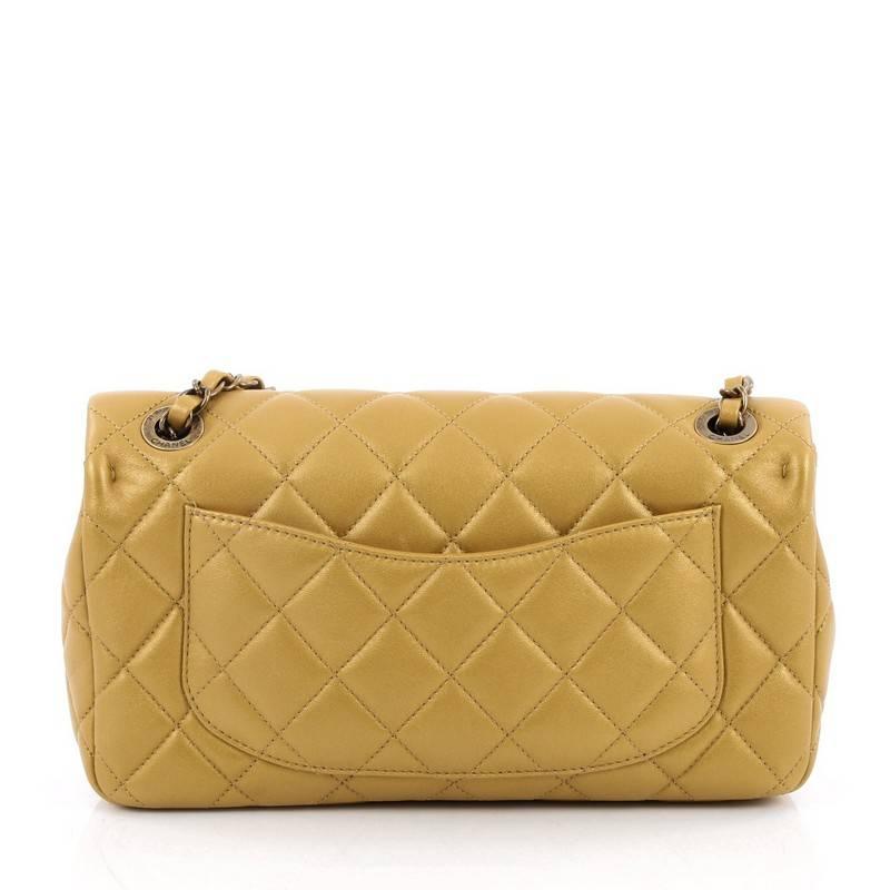 chanel gold coin flap bag