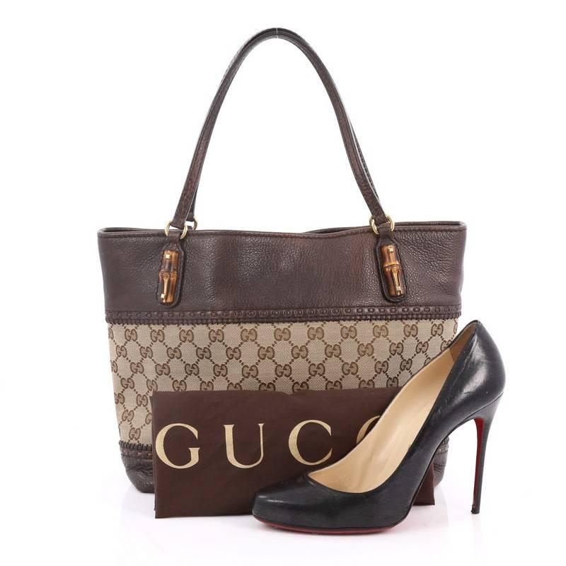 This authentic Gucci Laidback Crafty Tote GG Canvas and Leather Medium is a reinterpretation of the brand's rich heritage with modern, yet classic flair. Crafted from brown GG monogram with brown leather detail, this luxurious tote features