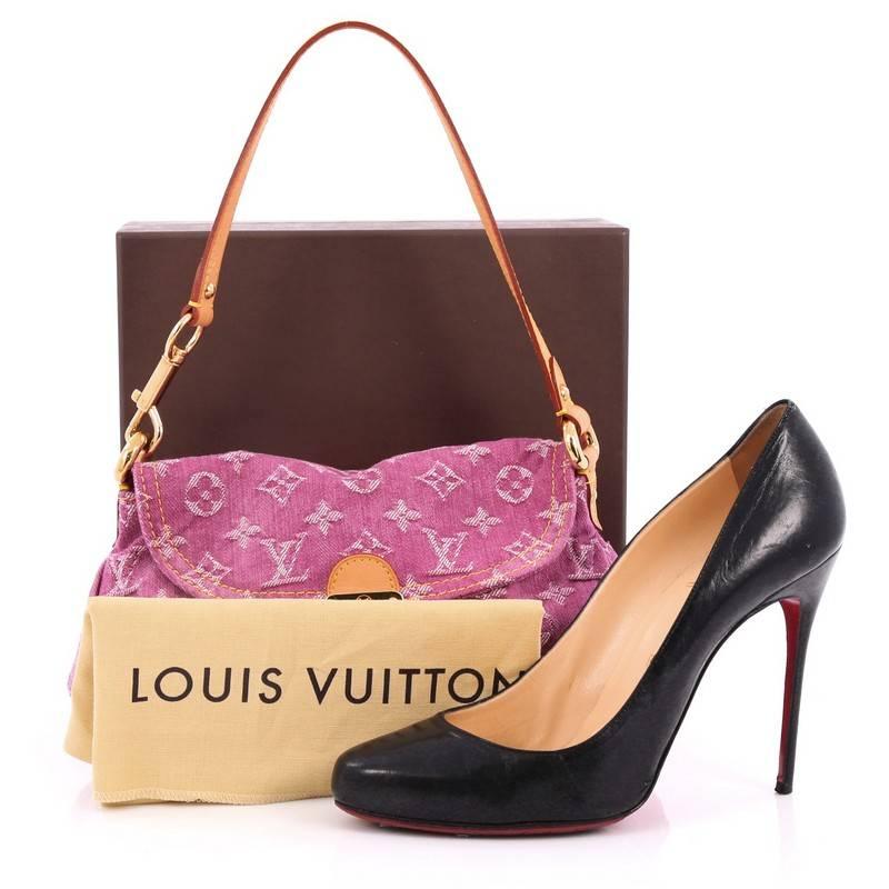 This authentic Louis Vuitton Pleaty Handbag Denim Mini is a fun and flirty bag from the brand's Monogram Denim collection. Crafted from pink monogram denim, this mini shoulder bag features an adjustable vachetta leather handle allowing it to