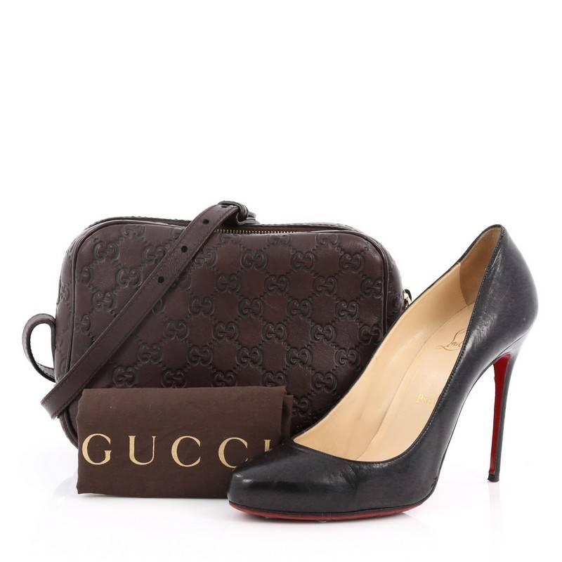This authentic Gucci Bree Disco Crossbody Bag Guccissima Leather Mini is the perfect summer accessory for on-the-go moments. Crafted from dark brown Guccissima leather with microguccissima leather detail, this small bag features adjustable strap and