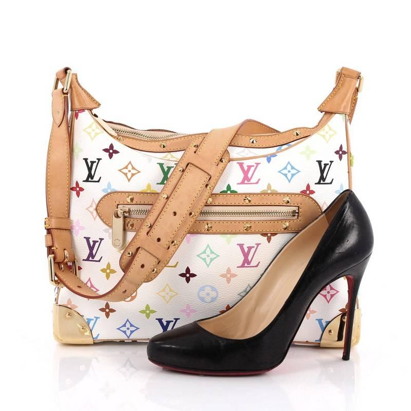 This authentic Louis Vuitton Boulogne Handbag Monogram Multicolor showcases a stylish and stunning design perfect for everyday use. Crafted from white monogram multicolor coated canvas, this bag features an adjustable shoulder strap, vachetta